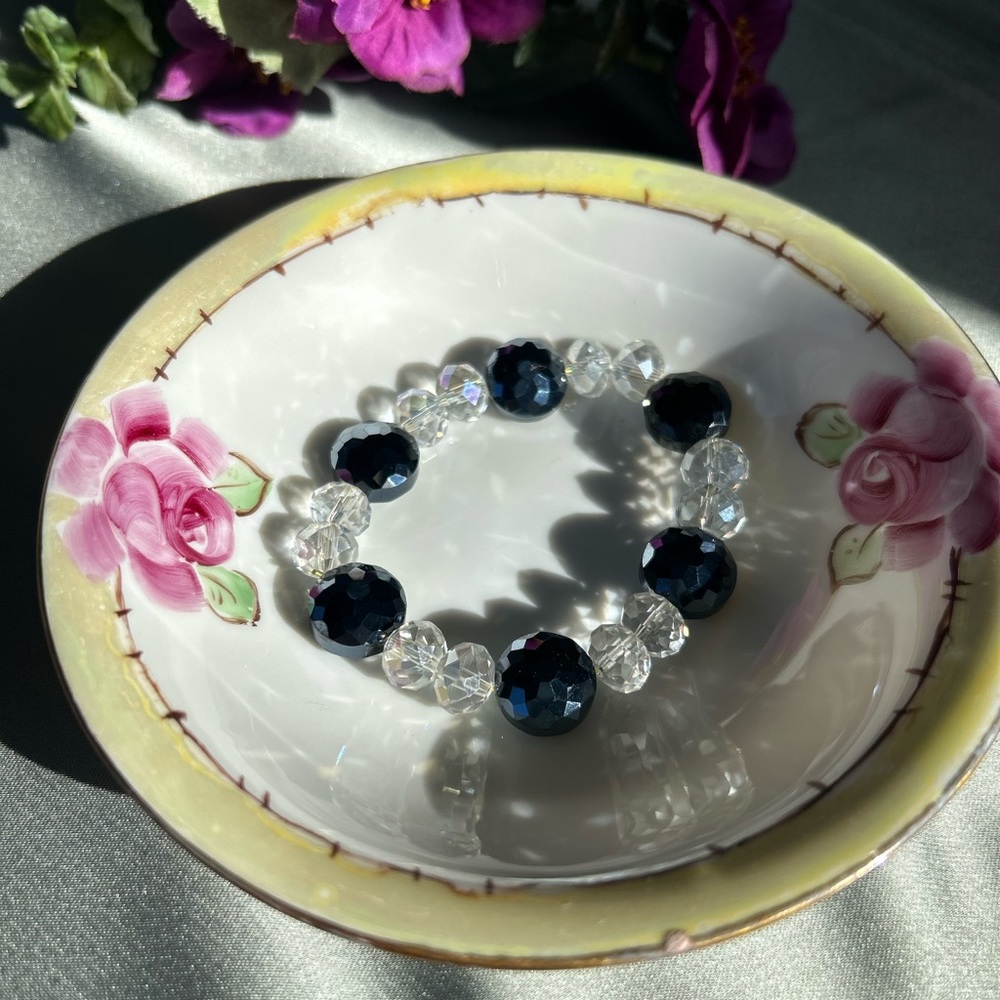 Handcrafted beaded stretchy bracelet with clear & black crystal cut bead…